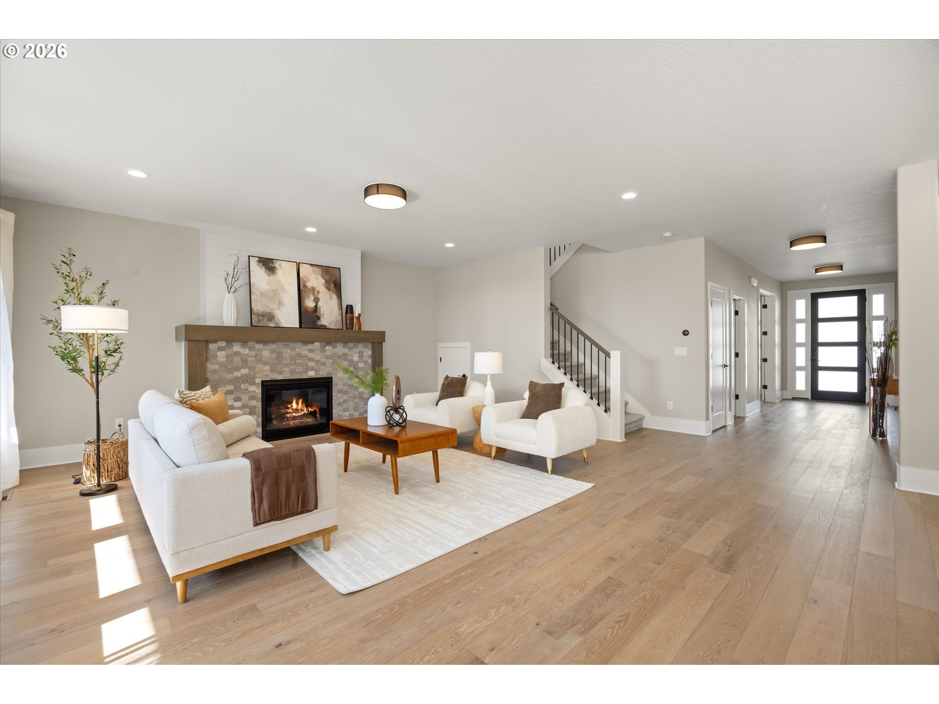 14551 Southwest 153rd Avenue Portland, OR 97224 - Photo 12 of 45 a living room with furniture and a fireplace
