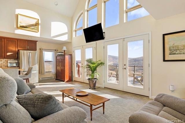 130 Hanley Road Fleischmanns, NY 12430 - Photo 12 of 39 a living room with furniture and a flat screen tv