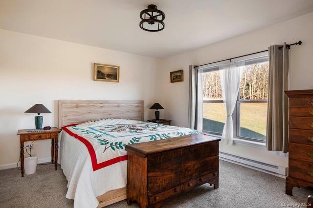 130 Hanley Road Fleischmanns, NY 12430 - Photo 15 of 39 a bedroom with a bed and a window