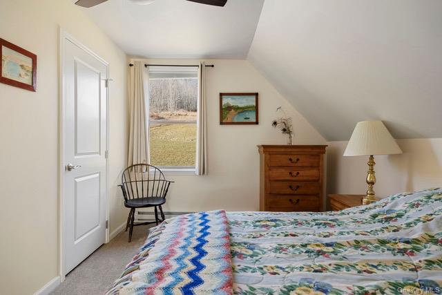 130 Hanley Road Fleischmanns, NY 12430 - Photo 25 of 39 a bedroom with a bed and dresser with mirror