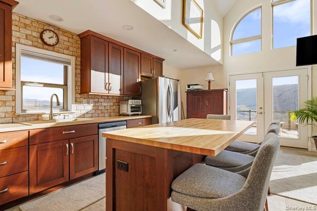 130 Hanley Road Fleischmanns, NY 12430 - Photo 3 of 39 a kitchen with stainless steel appliances kitchen island granite countertop a sink and cabinets