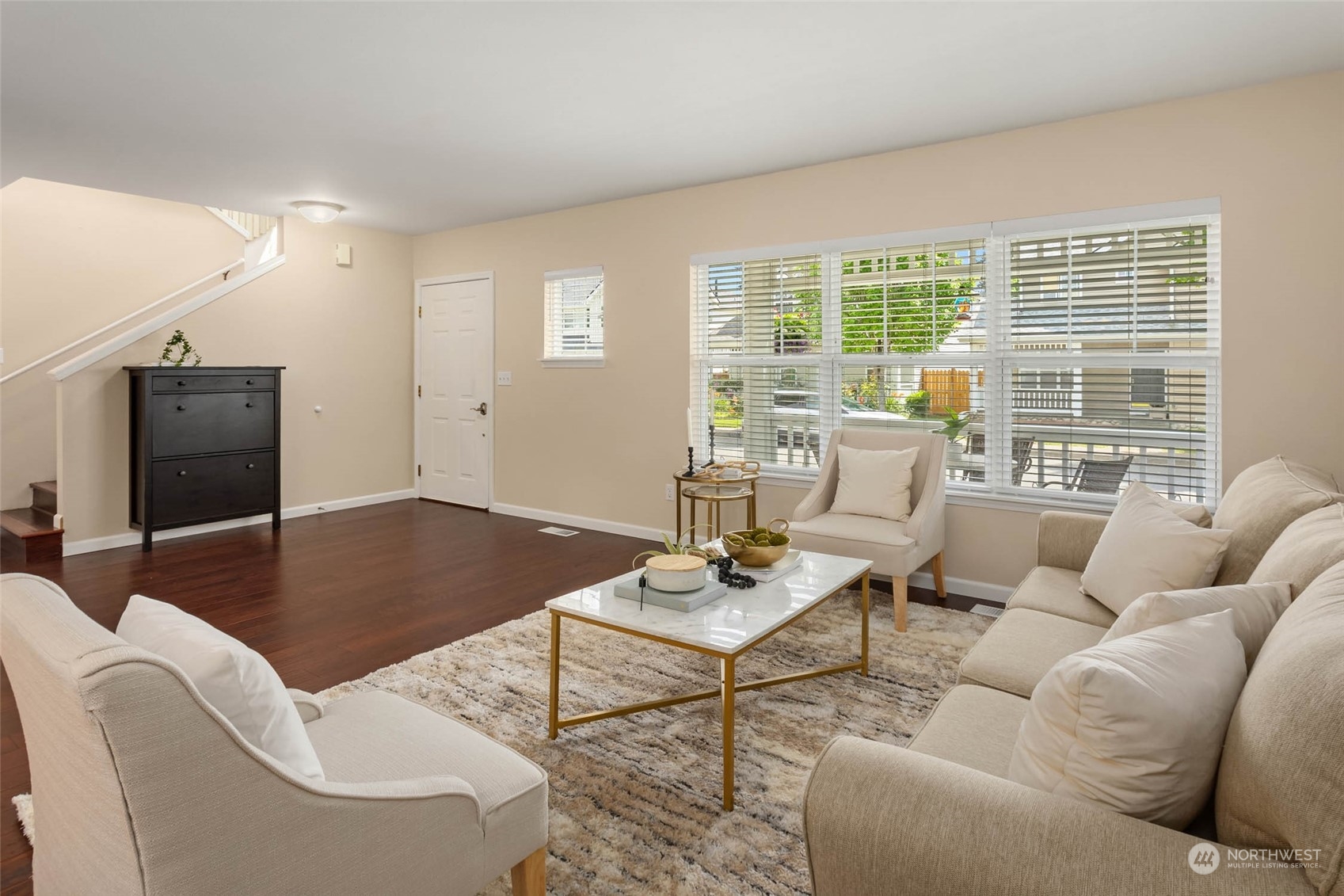 3910 Northeast 5th Place Renton, WA 98056 - Photo 6 of 27 a living room with furniture and a flat screen tv