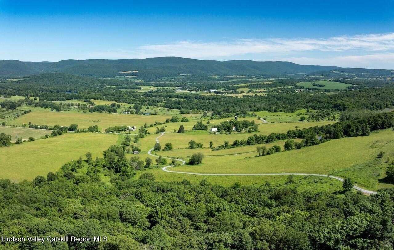 0 High Meadow Road Copake, NY 12516 - Photo 6 of 12 a view of a lush green hillside and houses