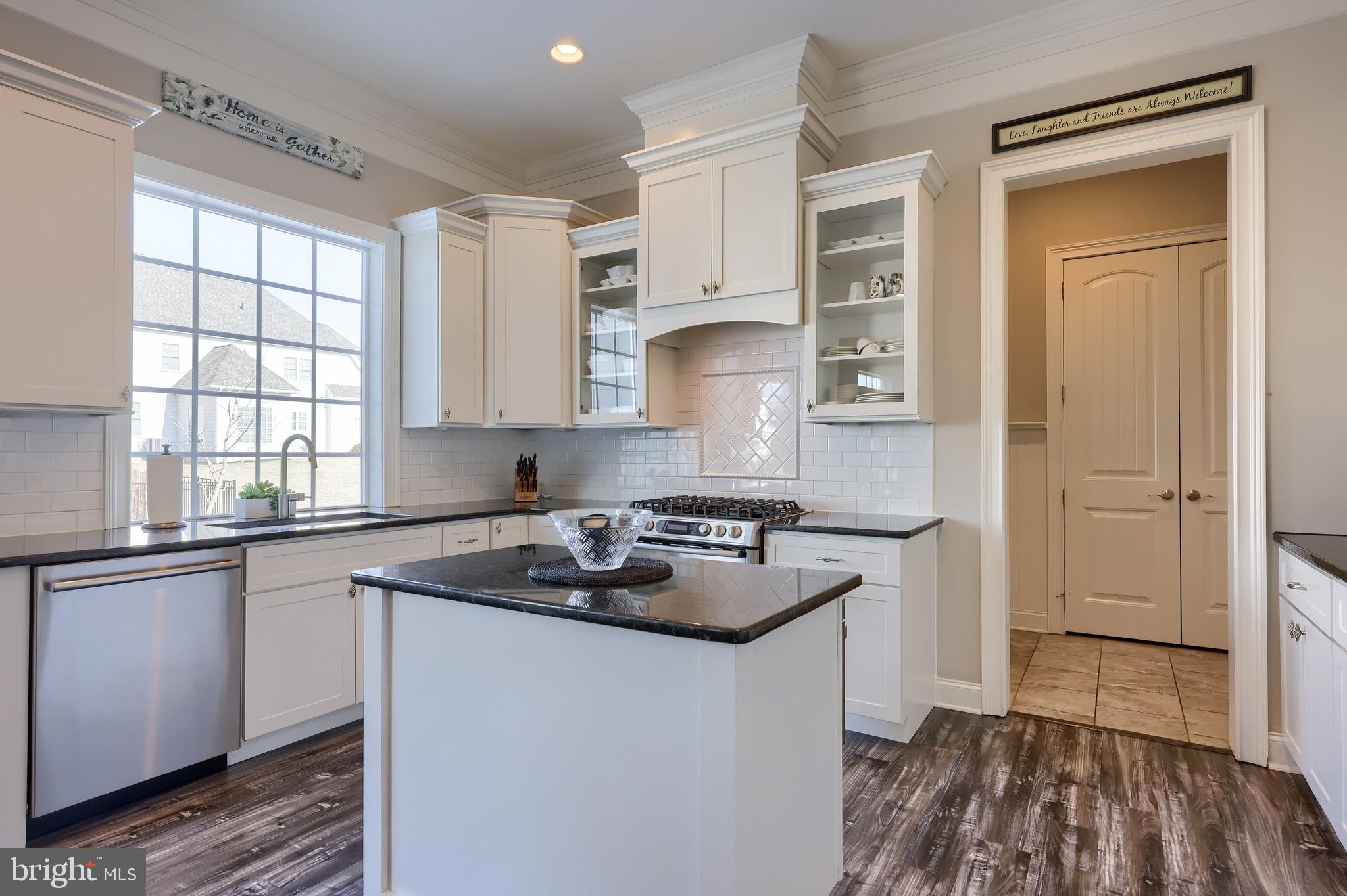 698 Warminster Lane Lititz, PA 17543 - Photo 12 of 49 a kitchen with a sink stove and cabinets