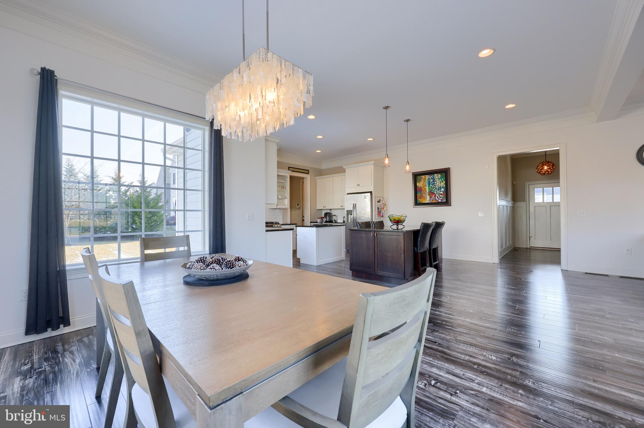 698 Warminster Lane Lititz, PA 17543 - Photo 19 of 49 a view of a dining room with furniture window and wooden floor