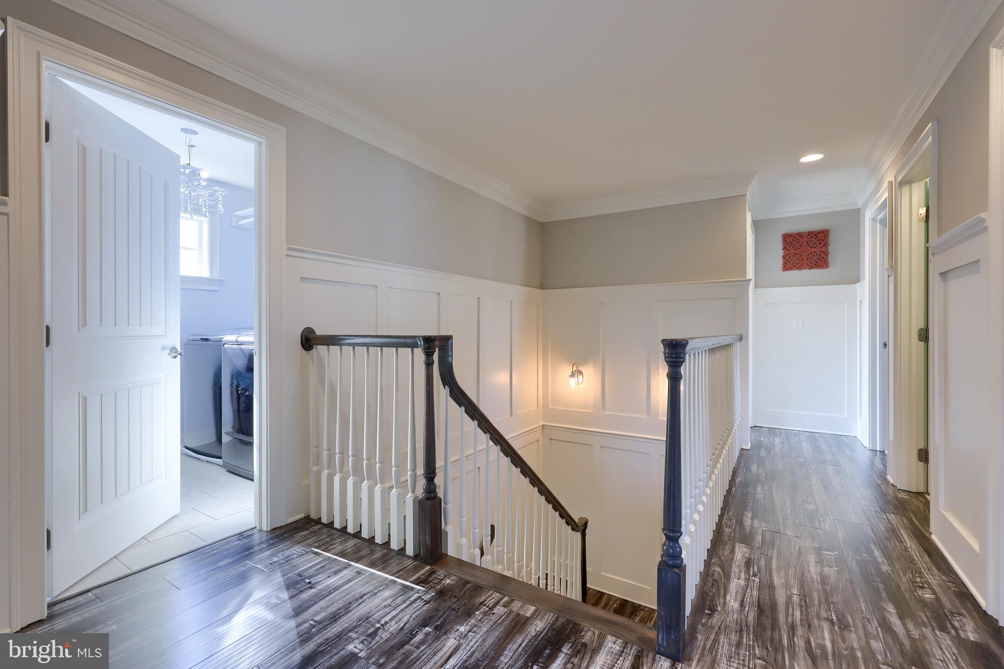 698 Warminster Lane Lititz, PA 17543 - Photo 28 of 49 a view of a hallway with wooden floor and staircase