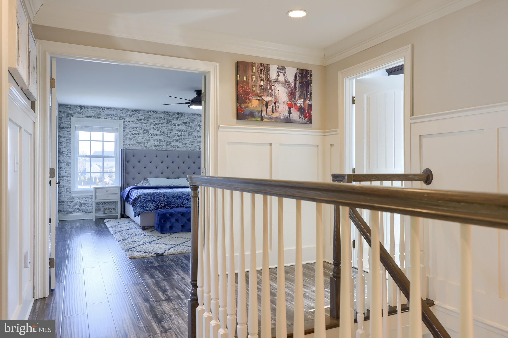 698 Warminster Lane Lititz, PA 17543 - Photo 29 of 49 a view of a hallway with wooden floor and stairs