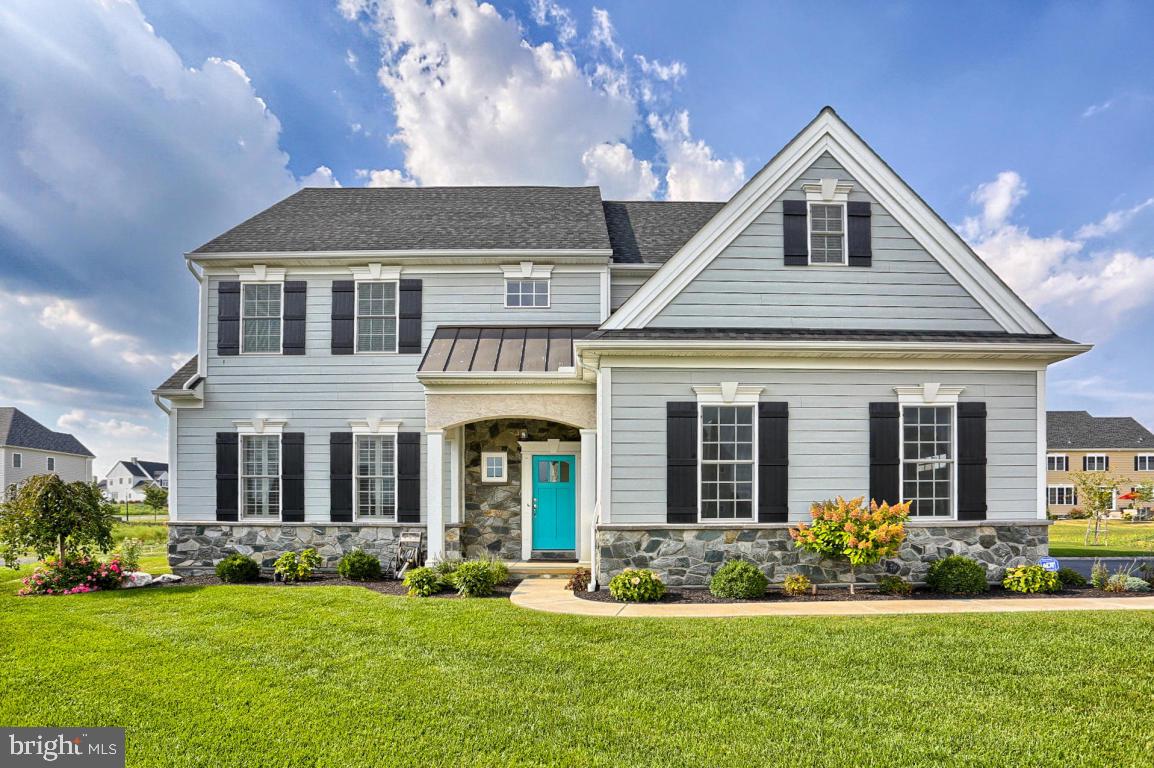 698 Warminster Lane Lititz, PA 17543 - Photo 3 of 49 a front view of a house with a yard
