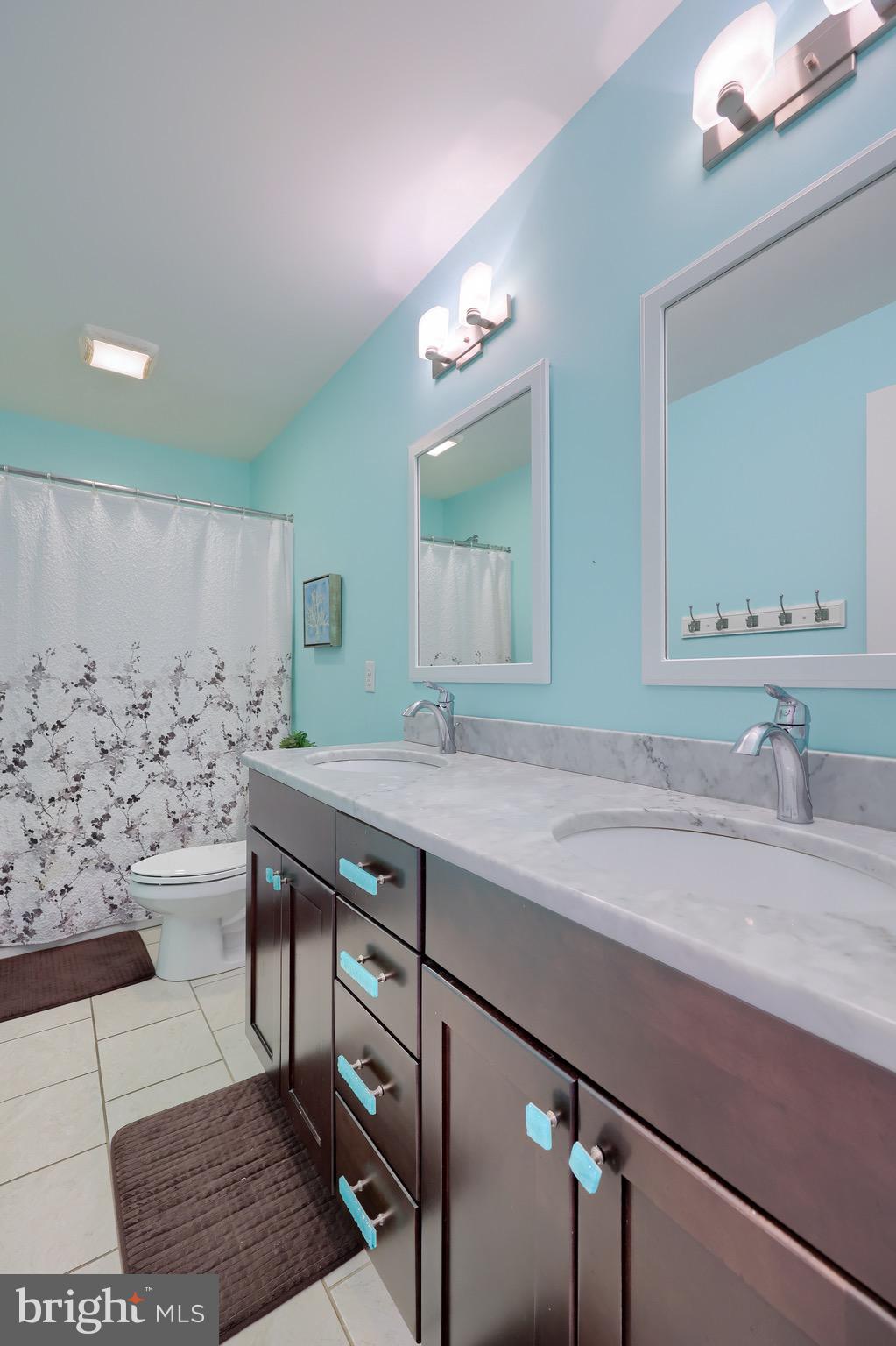 698 Warminster Lane Lititz, PA 17543 - Photo 37 of 49 a bathroom with a sink and a mirror