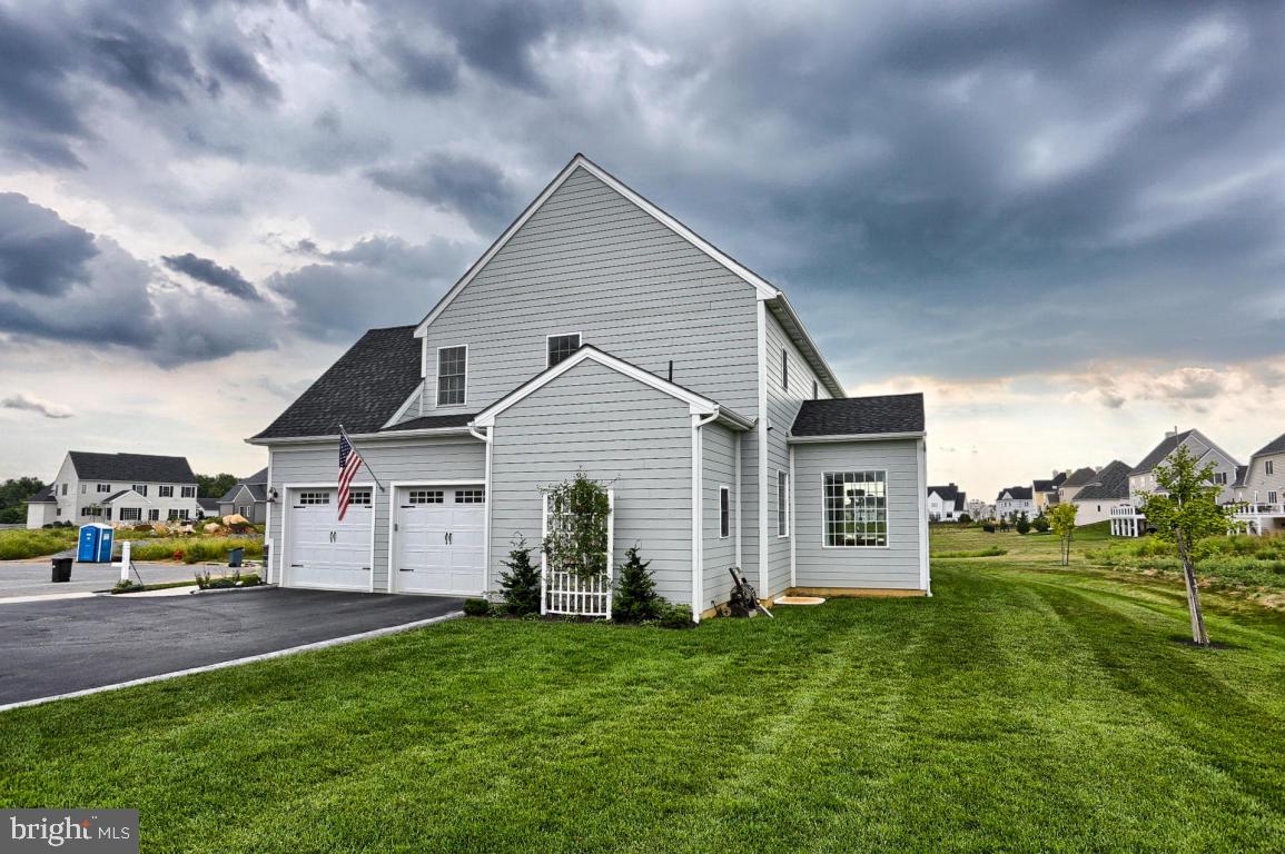 698 Warminster Lane Lititz, PA 17543 - Photo 41 of 49 a view of a house with a yard
