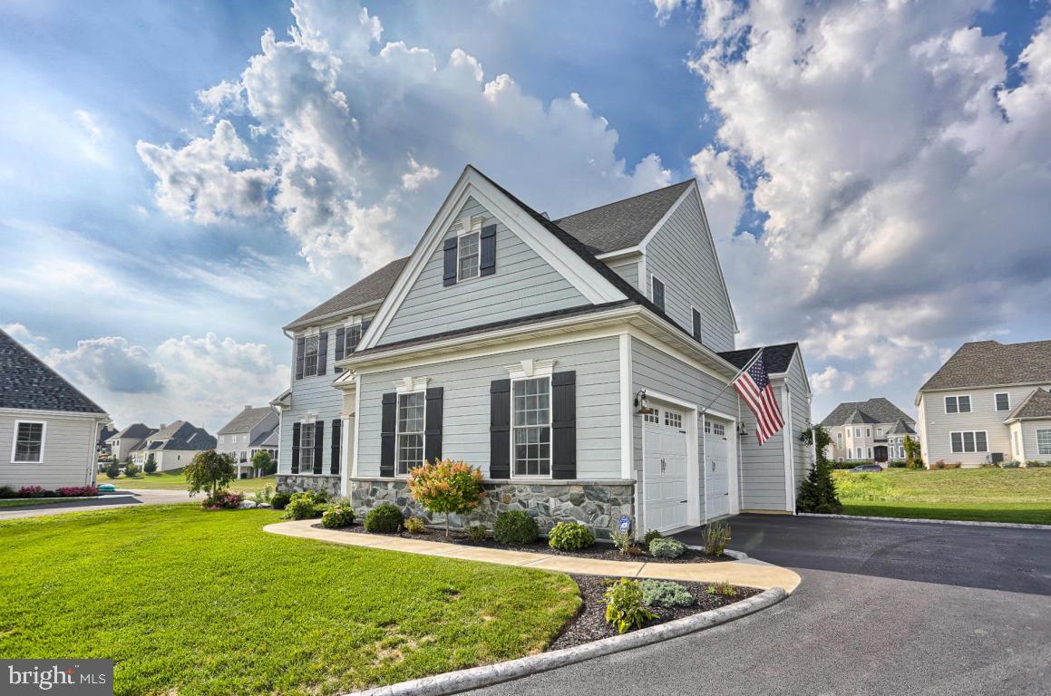 698 Warminster Lane Lititz, PA 17543 - Photo 43 of 49 a front view of a house with garden