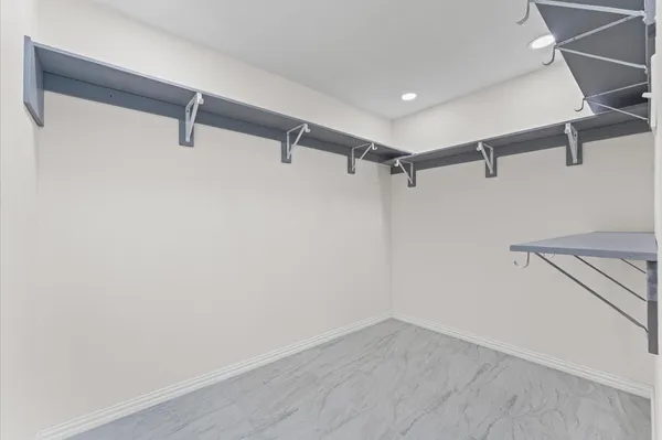 a view of a room with racks on the wall