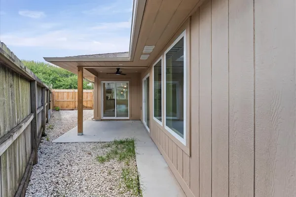 a view of backyard with green space