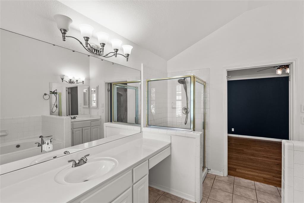 3901 Caney Creek Road Austin, TX 78732 - Photo 11 of 18 Primary bath with dual vanities and separate shower