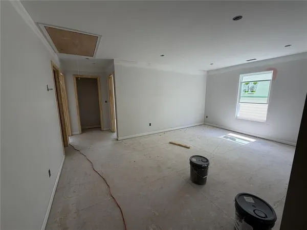 an empty room with windows