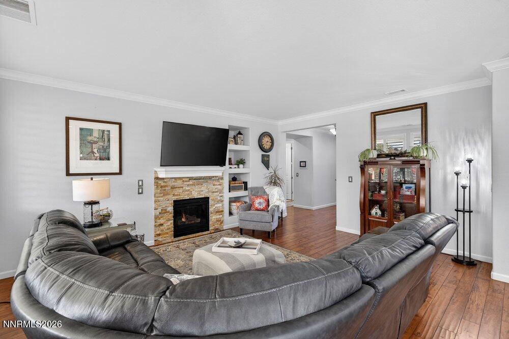 1473 Hogadon Way Reno, NV 89523 - Photo 12 of 40 a living room with furniture and a fireplace