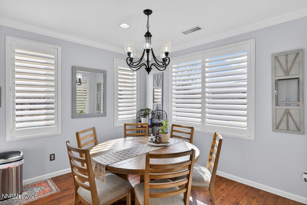 1473 Hogadon Way Reno, NV 89523 - Photo 14 of 40 a view of a dining room with furniture window and wooden floor