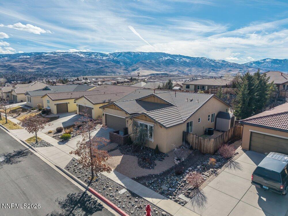 1473 Hogadon Way Reno, NV 89523 - Photo 2 of 40 an aerial view of a house with a mountain