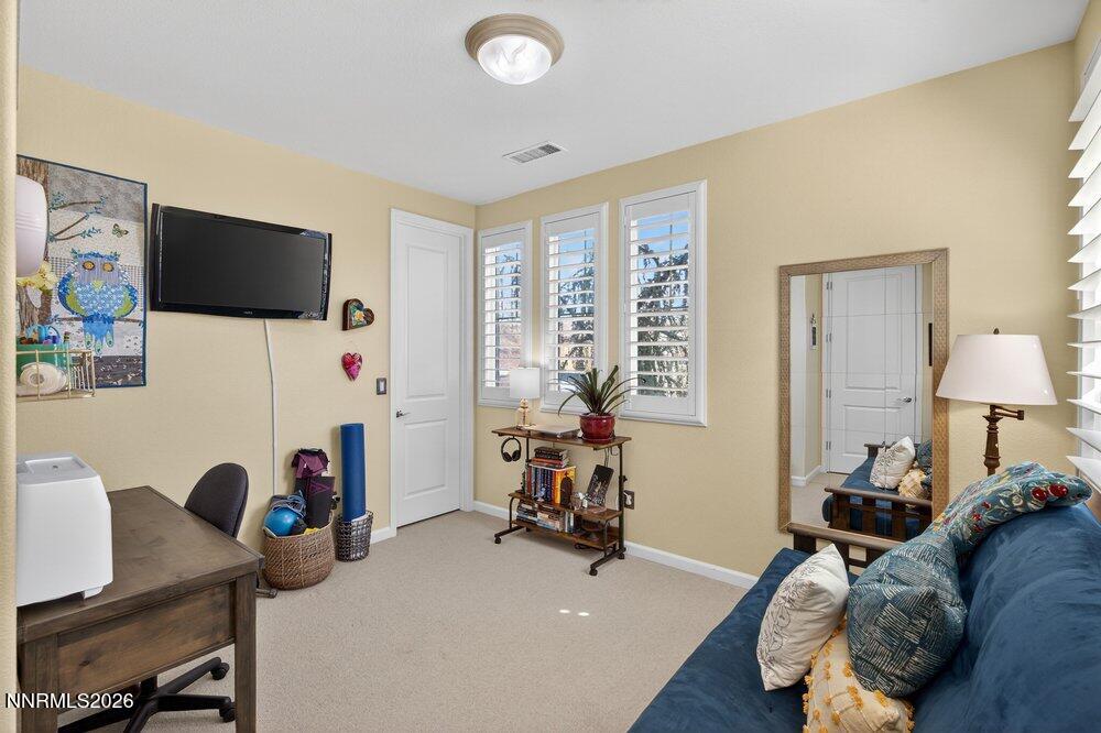1473 Hogadon Way Reno, NV 89523 - Photo 24 of 40 a view of a livingroom with workspace and a window