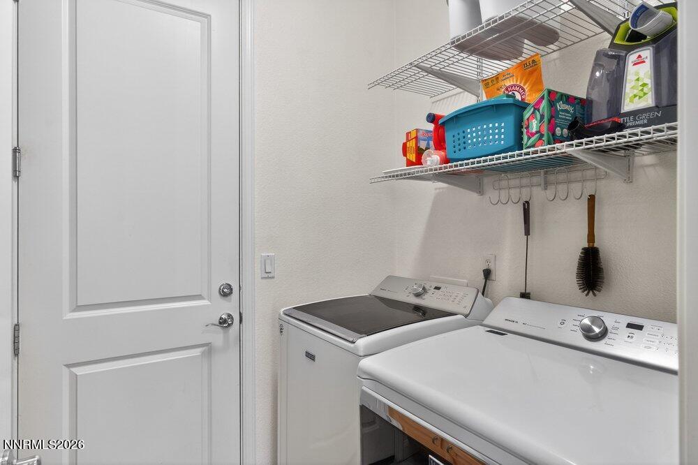 1473 Hogadon Way Reno, NV 89523 - Photo 26 of 40 a utility room with dryer and washer