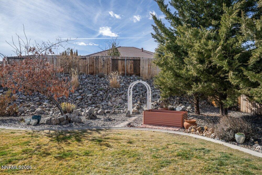 1473 Hogadon Way Reno, NV 89523 - Photo 31 of 40 a front view of a house with a yard