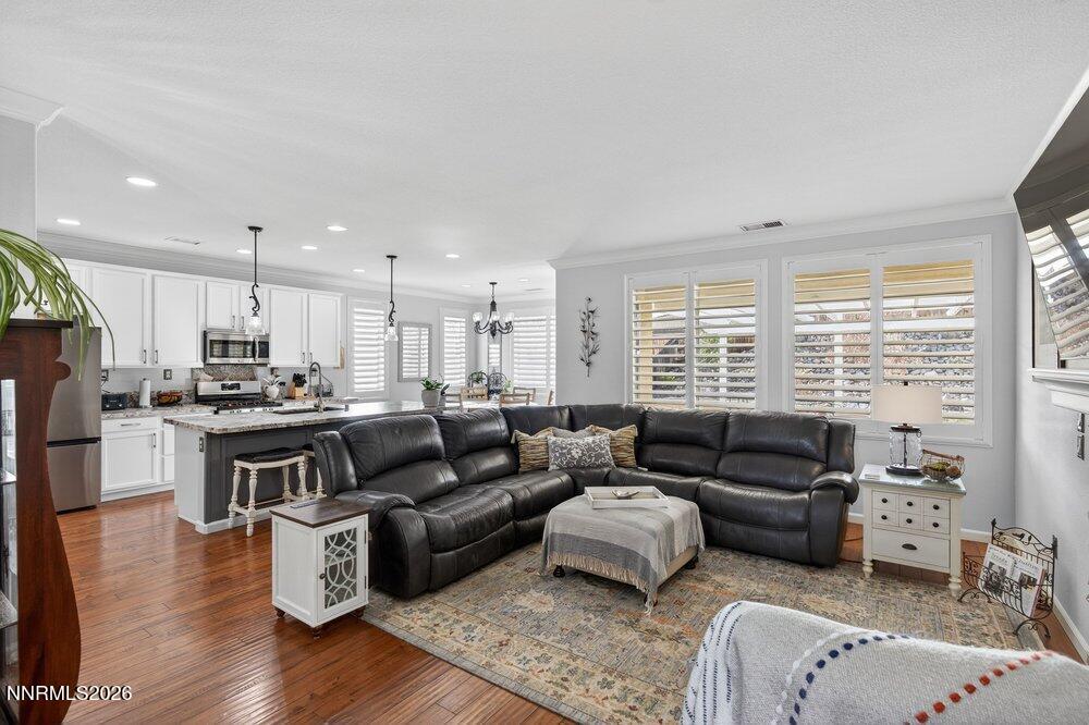 1473 Hogadon Way Reno, NV 89523 - Photo 6 of 40 a living room with furniture wooden floor and a large window