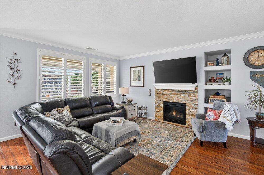 1473 Hogadon Way Reno, NV 89523 - Photo 7 of 40 a living room with furniture large window and a fireplace