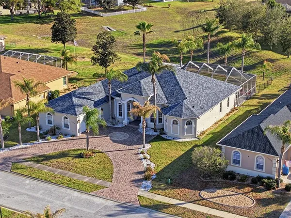 a aerial view of a house with a ocean view