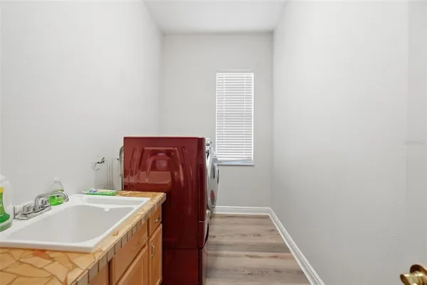 a very nice looking room with a large window and sitting area
