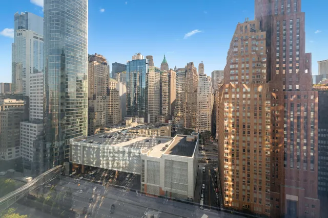 a view of a city with tall buildings