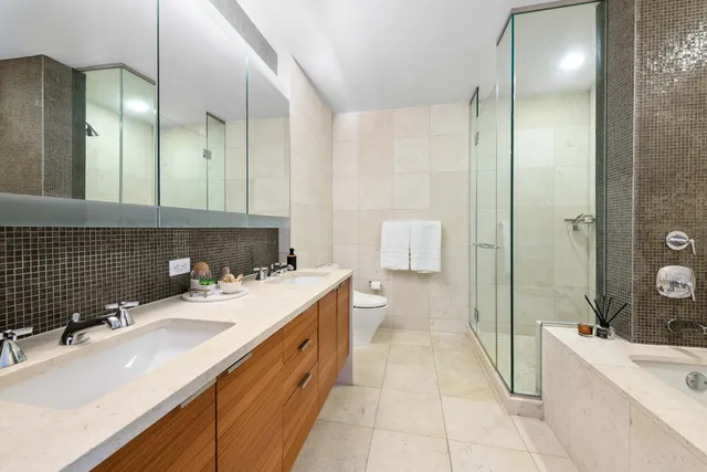 a bathroom with a tub and a sink