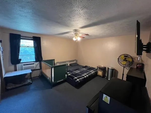 a room with furniture and a window