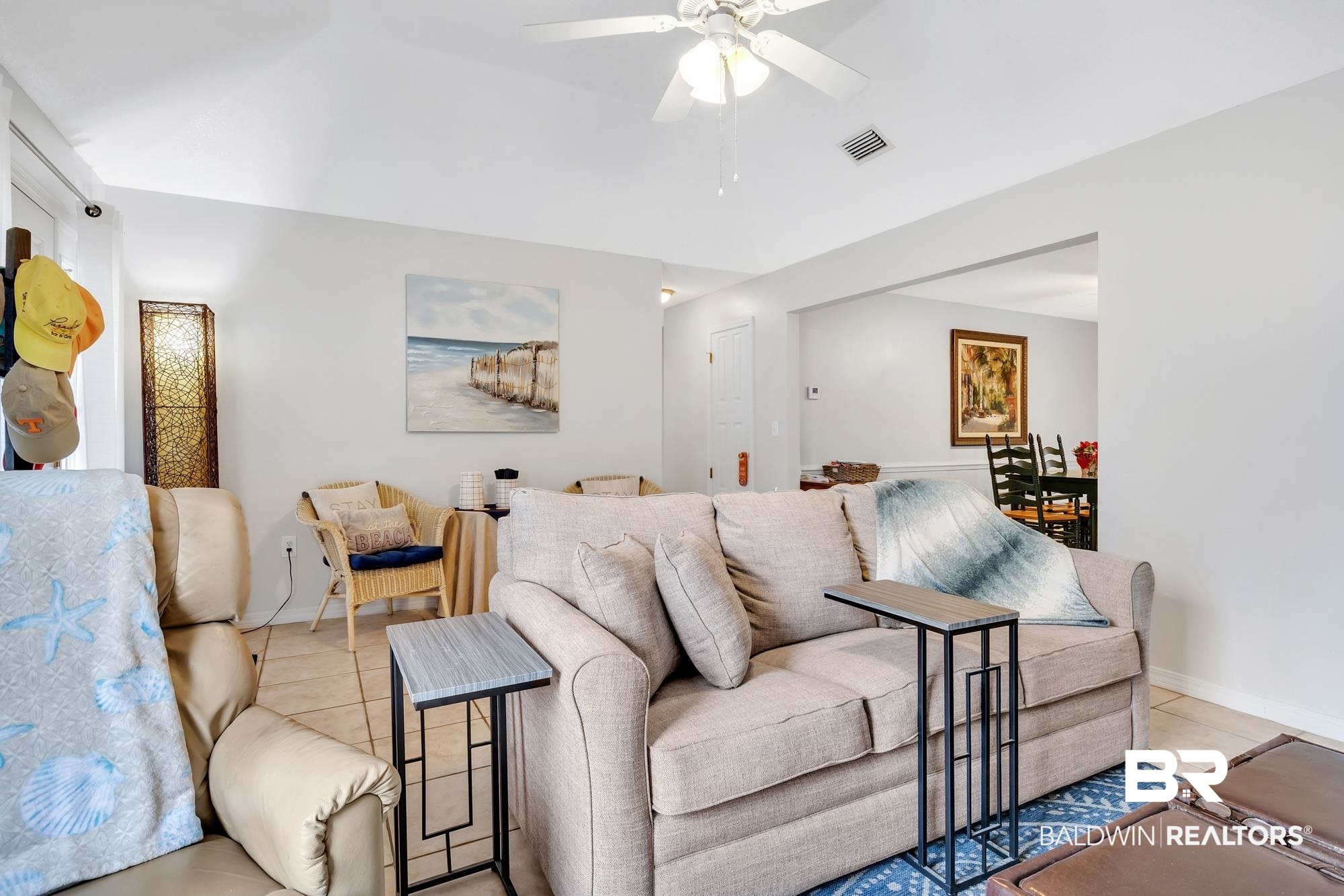 105 Cluster Oaks Court Foley, AL 36535 - Photo 12 of 26 Living room with light tile patterned floors and a ceiling fan