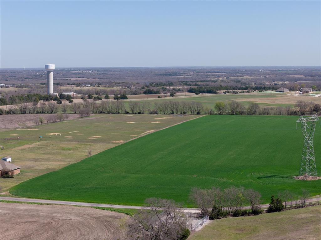 Tbd John Marr Road Van Alstyne, TX 75495 - Photo 3 of 21 an aerial view of a city with lawn chairs