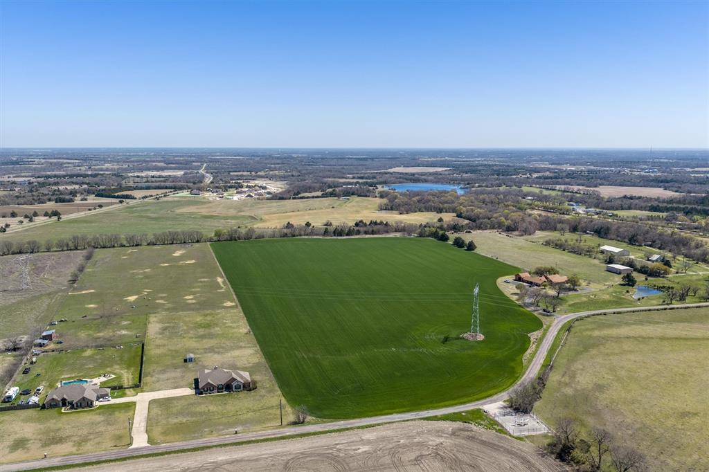 Tbd John Marr Road Van Alstyne, TX 75495 - Photo 8 of 21 an aerial view of a house with a ocean view