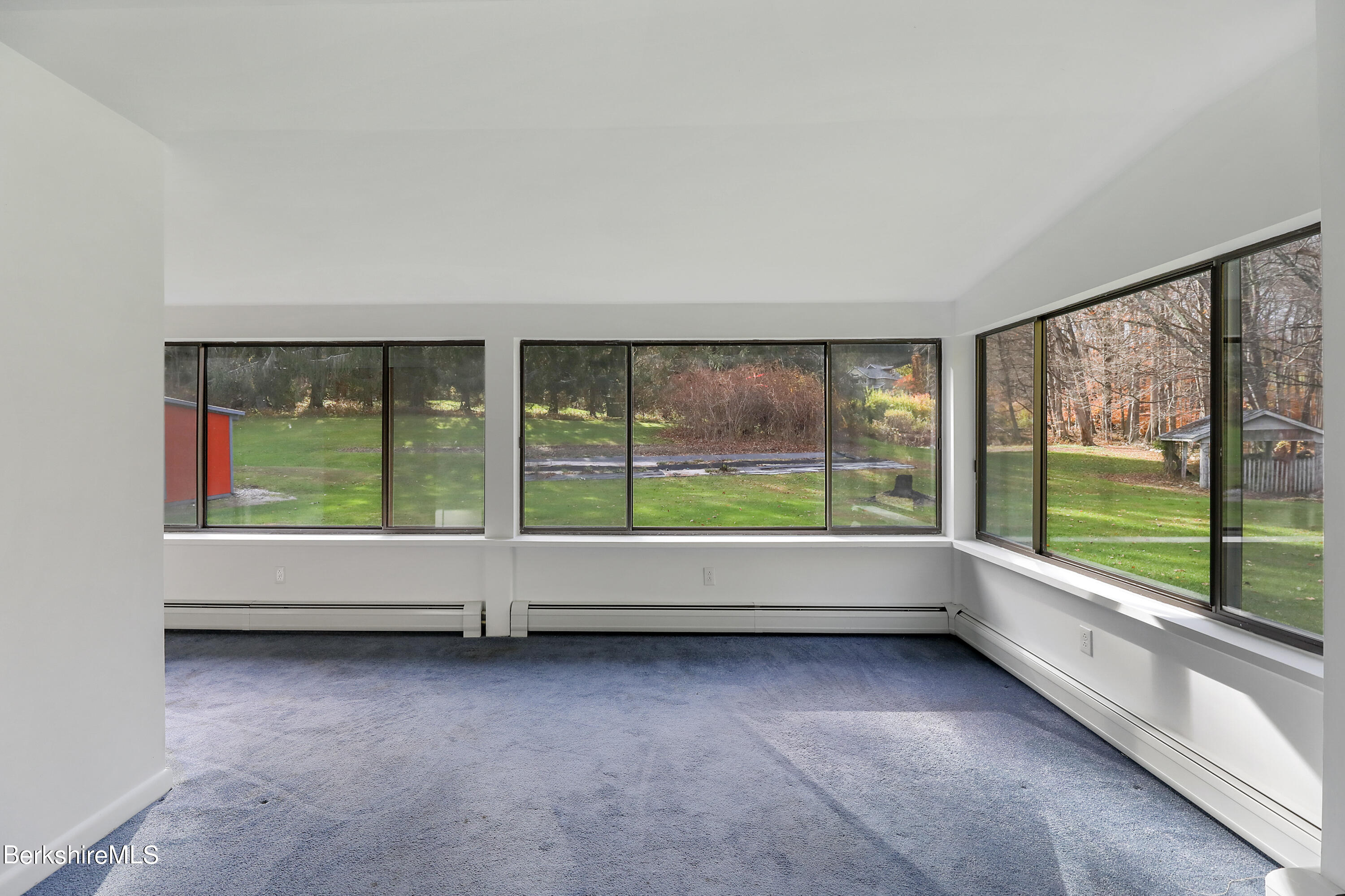 34 West Center Road West Stockbridge, MA 01266 - Photo 11 of 30 wooden floor in an empty room with a large window