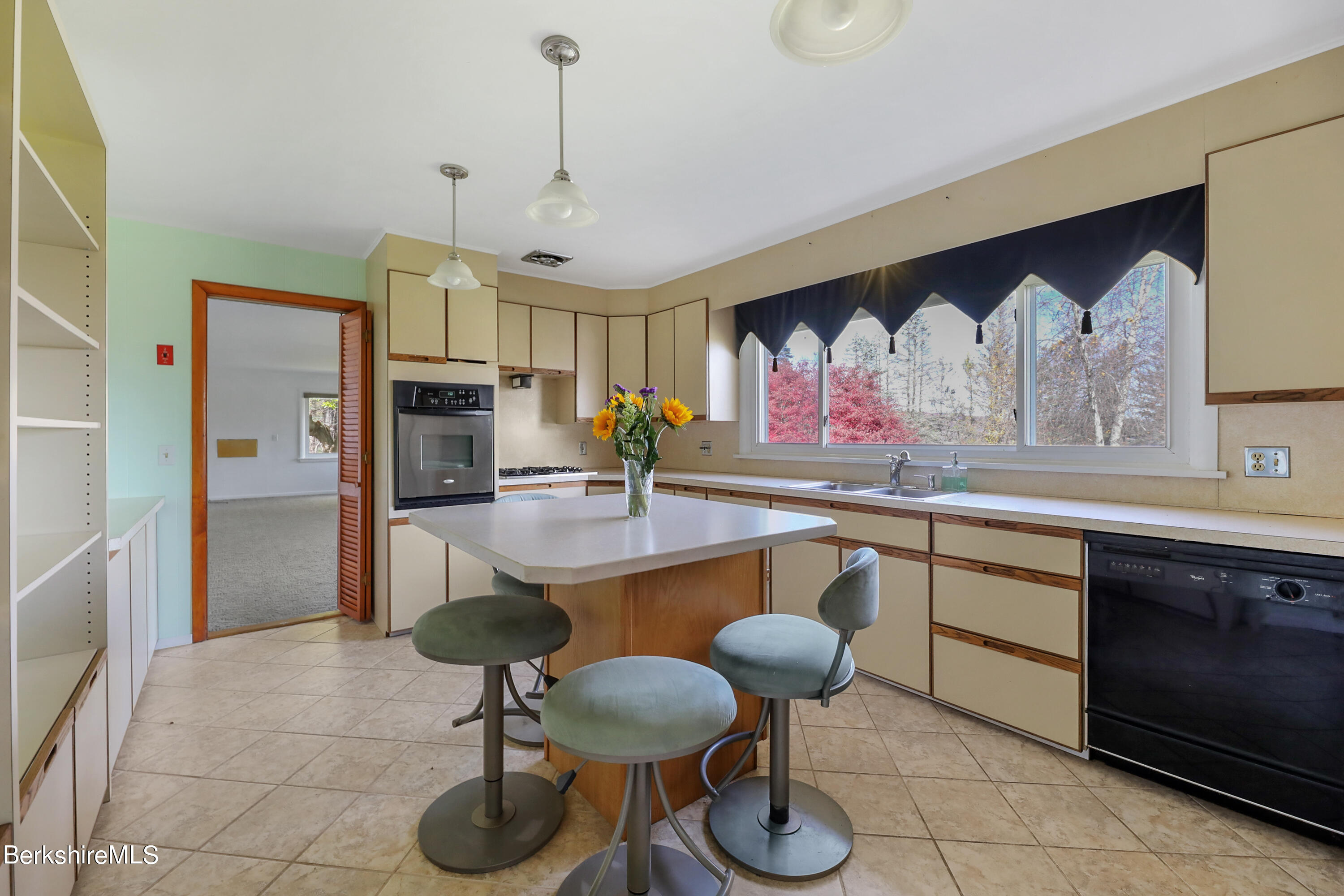 34 West Center Road West Stockbridge, MA 01266 - Photo 13 of 30 a kitchen with stainless steel appliances granite countertop a sink and a refrigerator