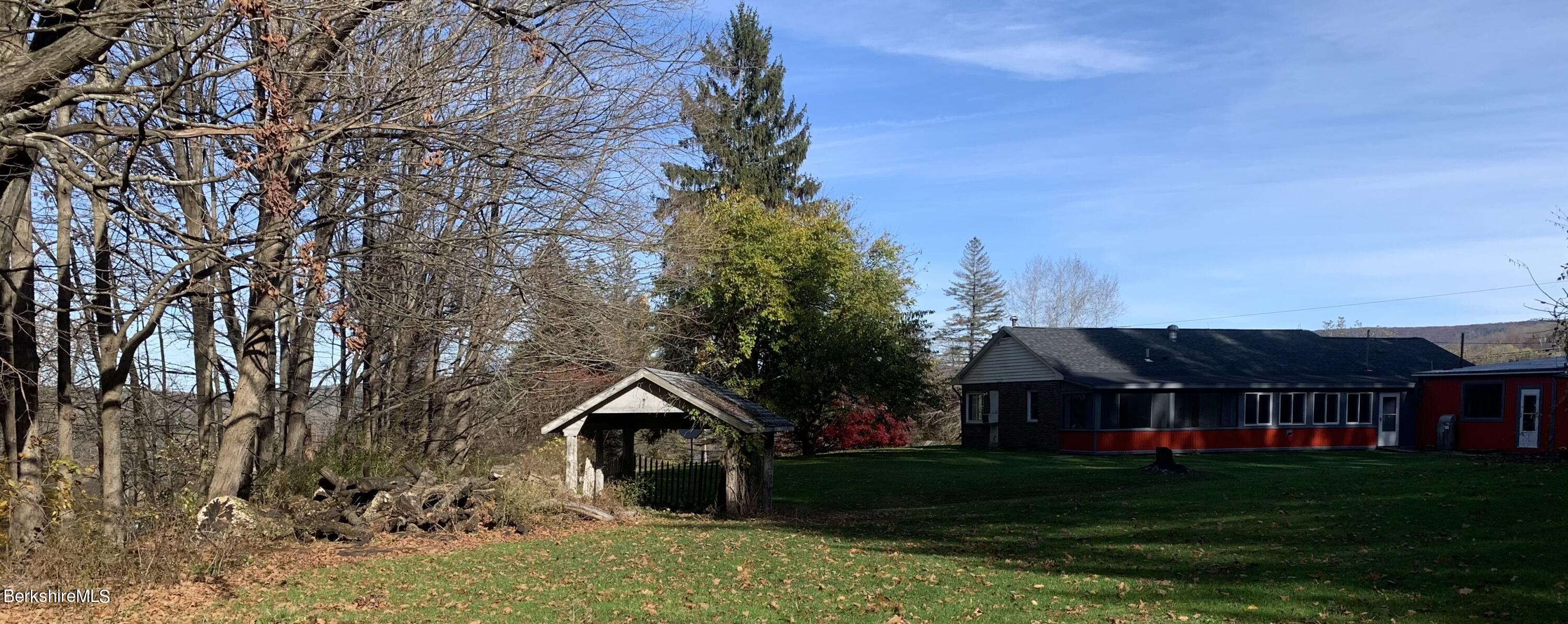 34 West Center Road West Stockbridge, MA 01266 - Photo 27 of 30 a view of a big house with a big yard and large trees