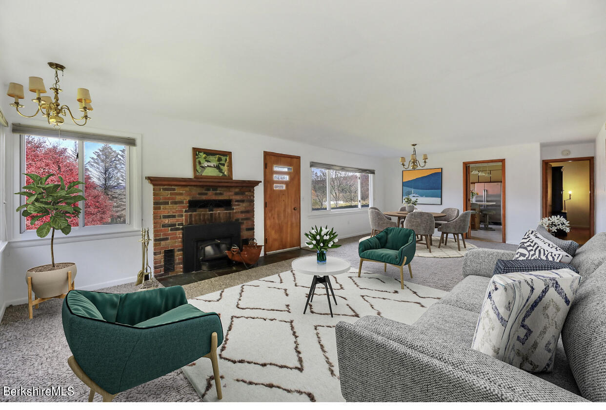 34 West Center Road West Stockbridge, MA 01266 - Photo 3 of 30 a living room with furniture or couch and a fireplace
