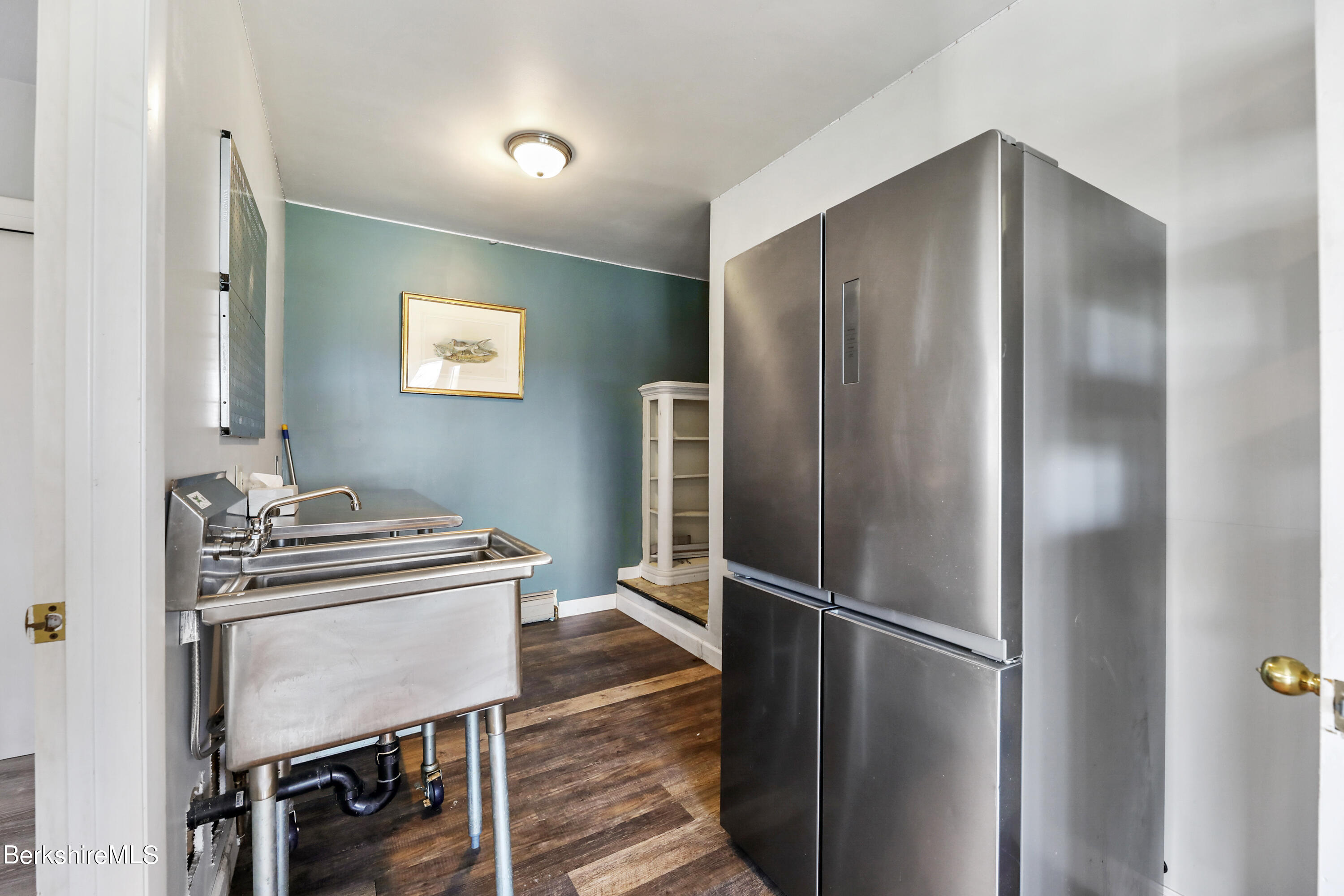 34 West Center Road West Stockbridge, MA 01266 - Photo 6 of 30 a kitchen with metallic refrigerator and white stove top oven
