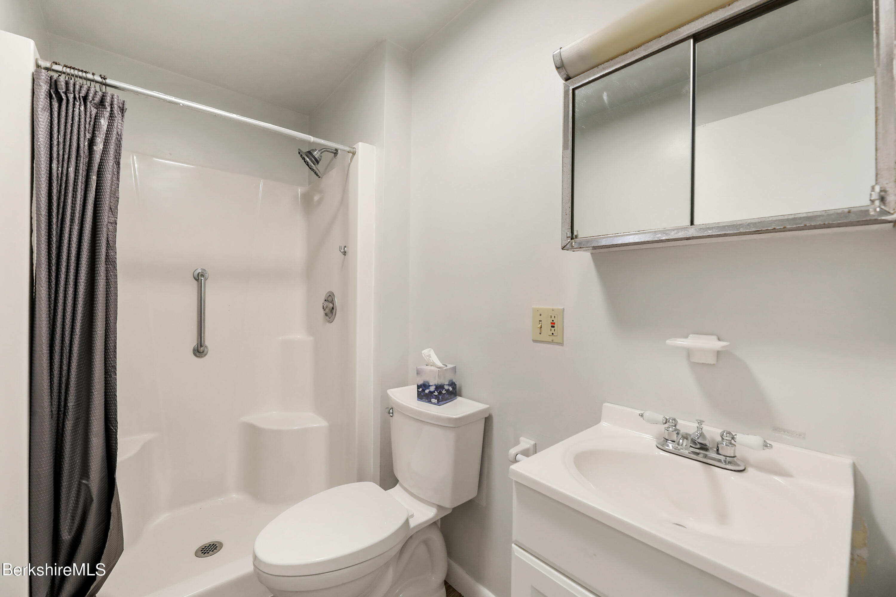 34 West Center Road West Stockbridge, MA 01266 - Photo 9 of 30 a bathroom with a sink a toilet and shower