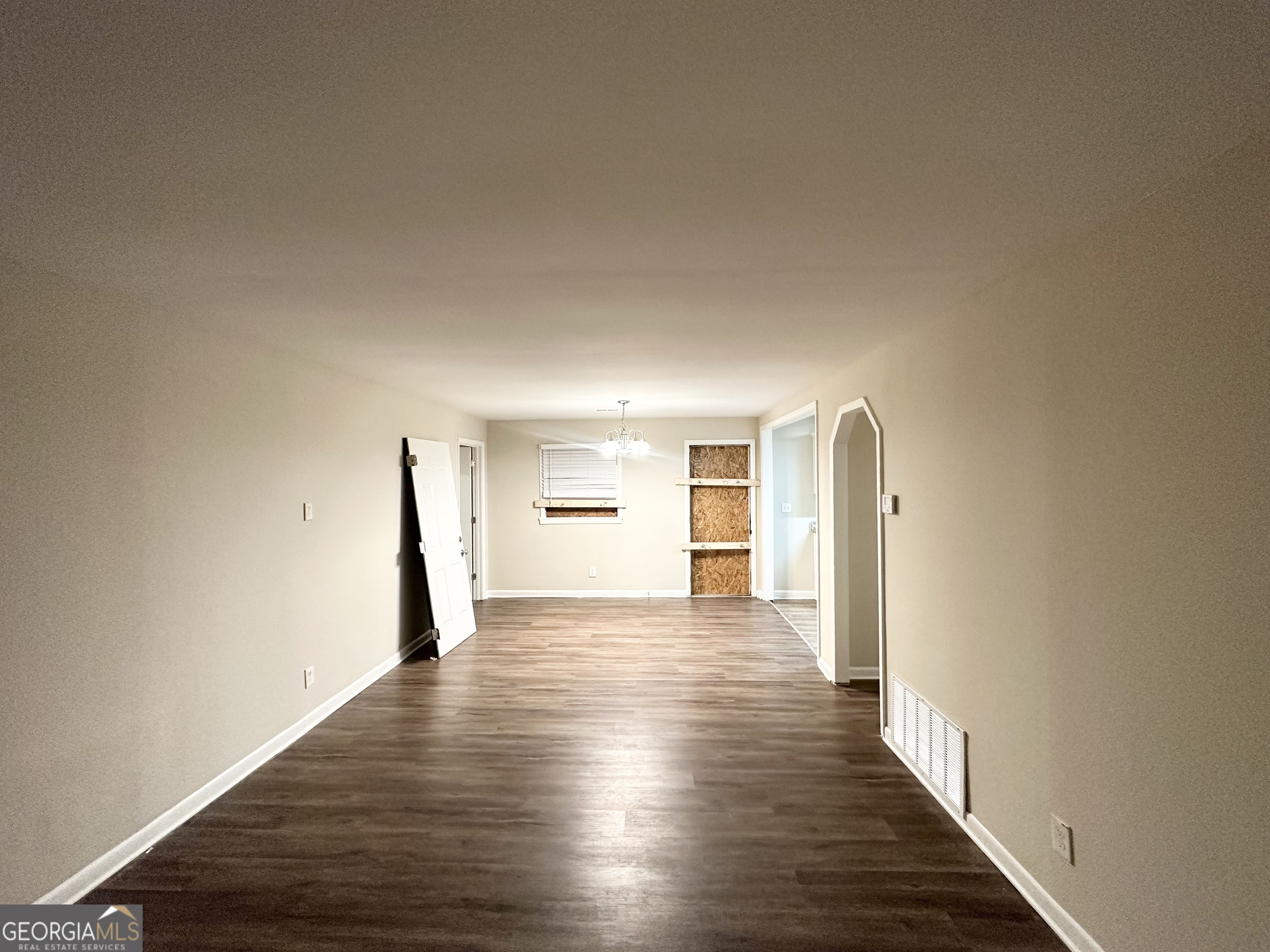4390 Mercer Road Decatur, GA 30035 - Photo 4 of 11 a view of a big room with wooden floor