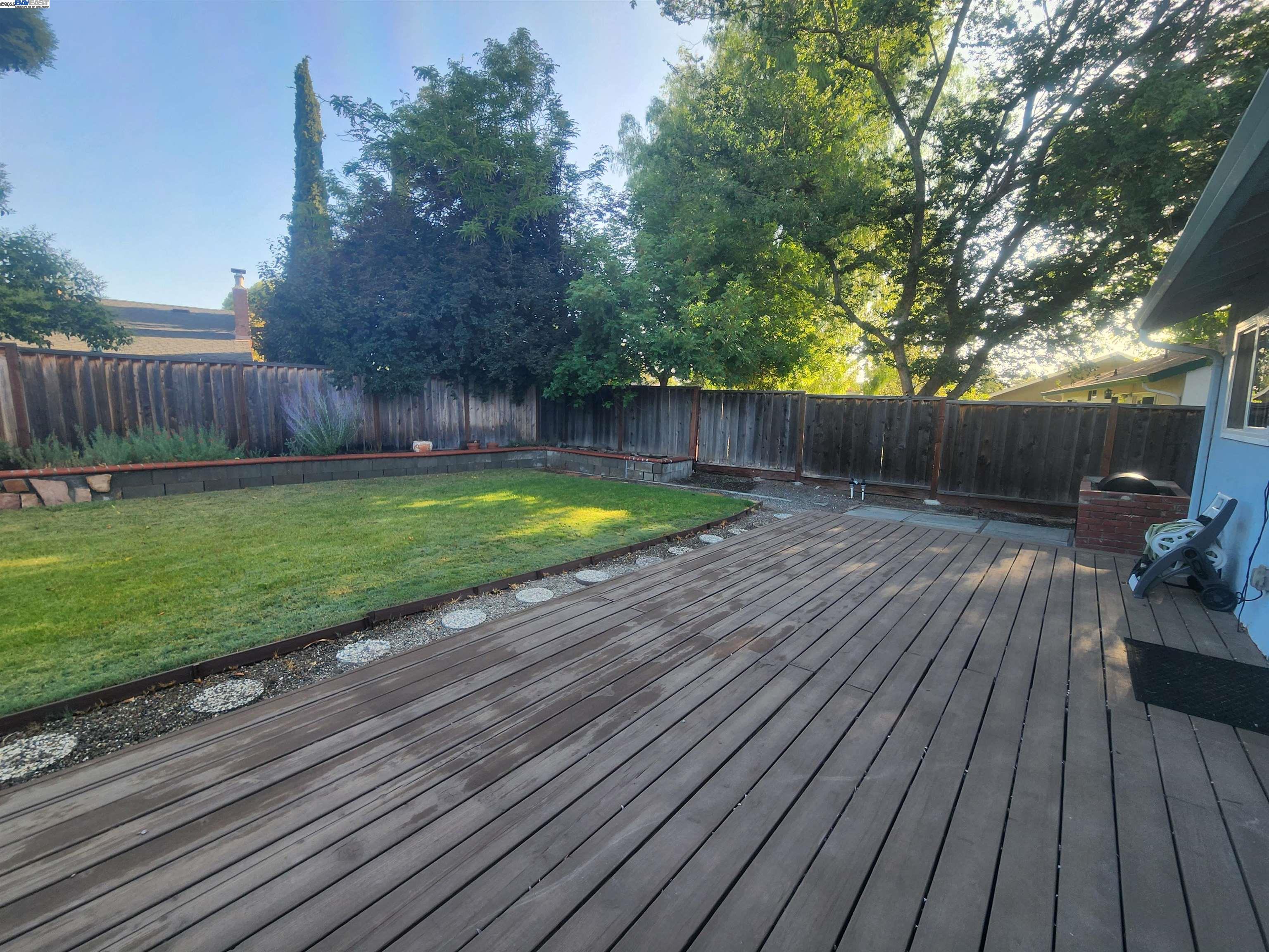 1733 Carnation Circle Livermore, CA 94551 - Photo 25 of 27 a view of a backyard with wooden floor