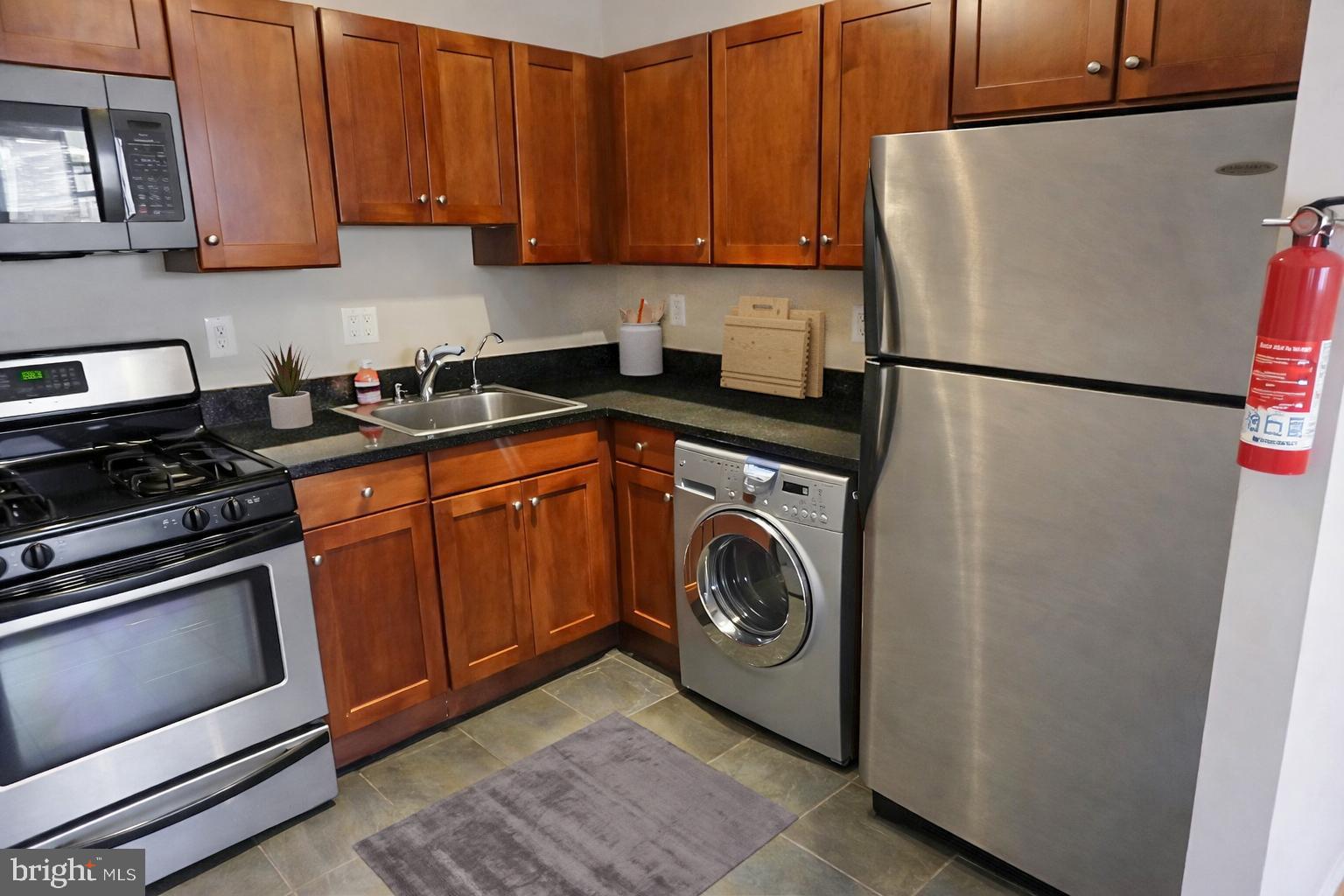 3101 Naylor Road Southeast, Unit 304 Washington, DC 20020 - Photo 5 of 16 Kitchen (Virtually Staged)