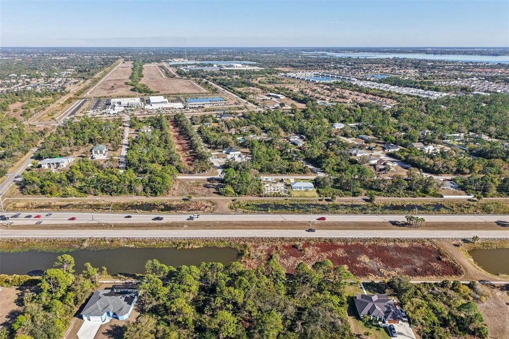 3124 Vessels Road Punta Gorda, FL 33980 - Photo 5 of 13 an aerial view of beach and residential houses with outdoor space and trees