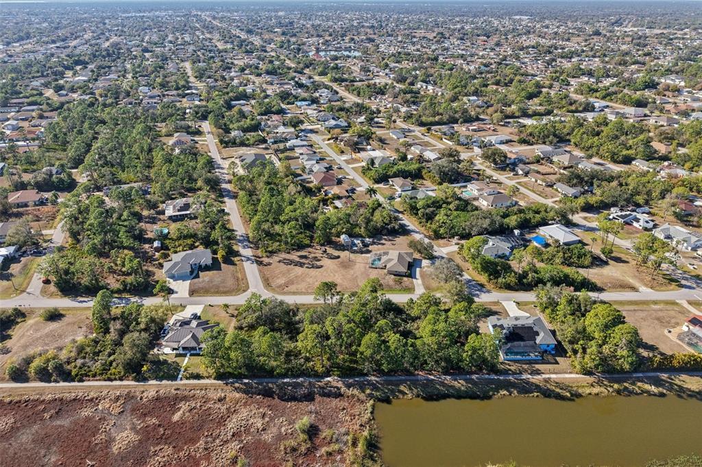 3124 Vessels Road Punta Gorda, FL 33980 - Photo 8 of 13 an aerial view of residential houses with outdoor space and trees