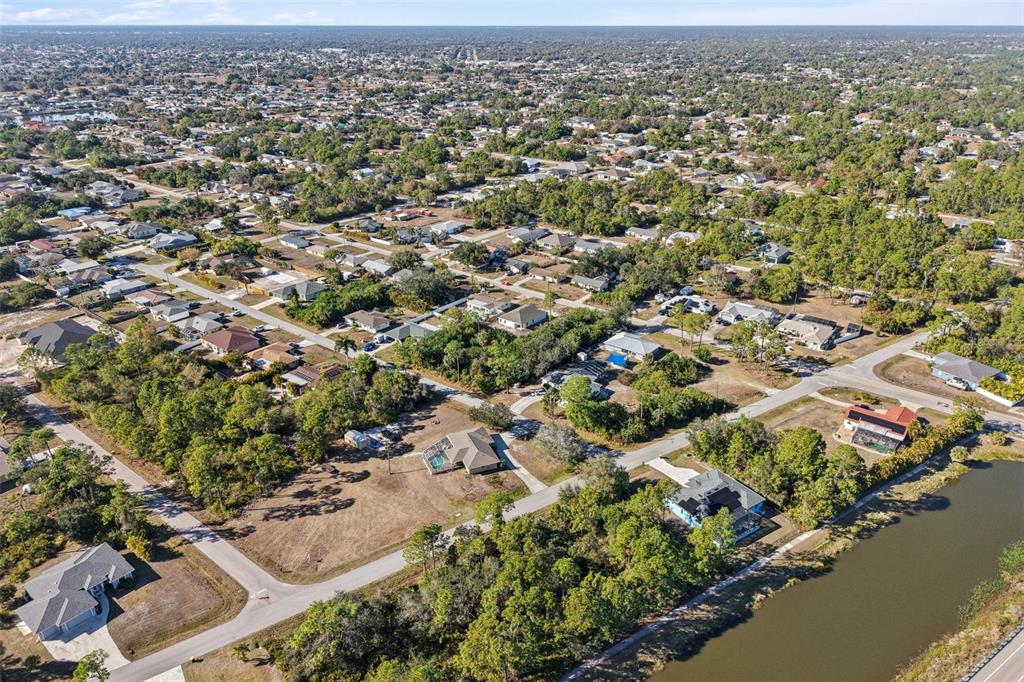 3124 Vessels Road Punta Gorda, FL 33980 - Photo 10 of 13 an aerial view of residential houses with outdoor space and trees