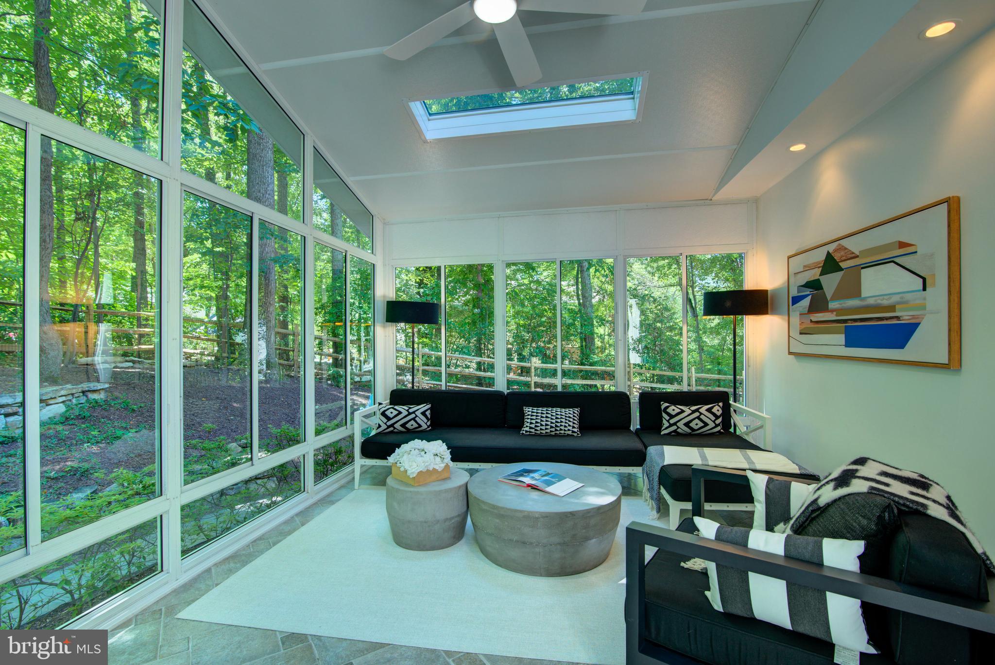 12029 Lake Newport Road Reston, VA 20194 - Photo 12 of 30 Sunroom with Ceiling Fan and Skylights.
