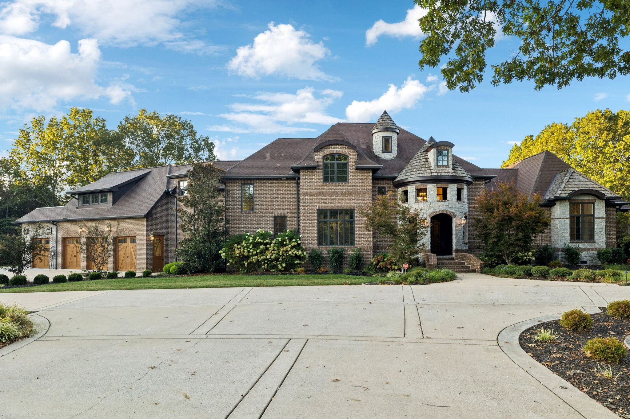 1856 Mires Road Mount Juliet, TN 37122 - Photo 30 of 93 a front view of a house with a garden and tree
