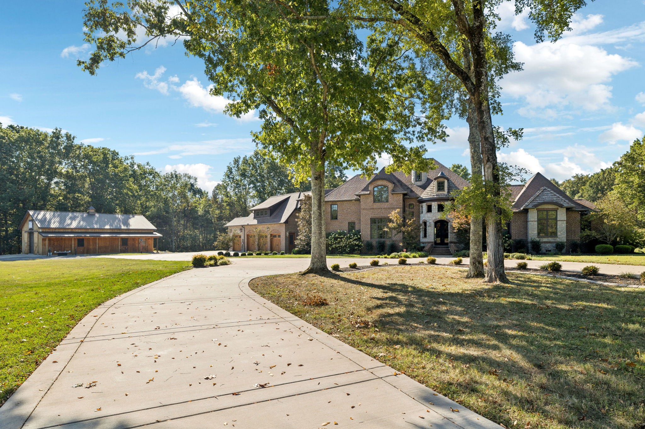 1856 Mires Road Mount Juliet, TN 37122 - Photo 35 of 93 a front view of a house with a yard and trees